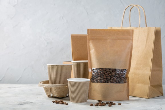Various brown paper-based bags, cups, and containers.
