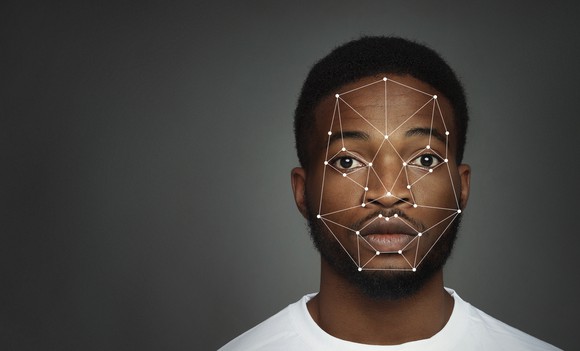 Representation of facial recognition technology on black male's face
