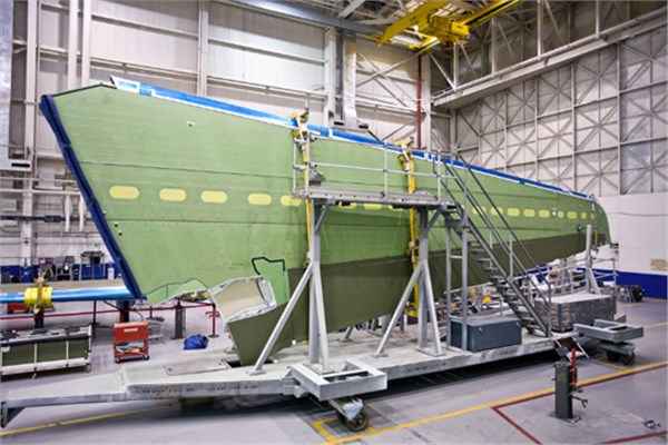 A business jet wing assembly in production.