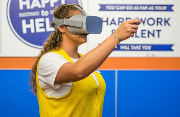 Walmart worker in virtual reality. 