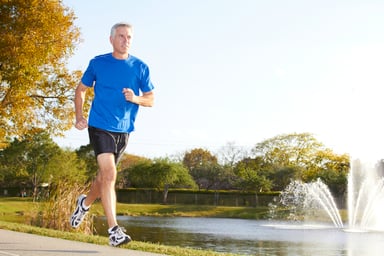 Older man jogging outdoors_GettyImages-162331740