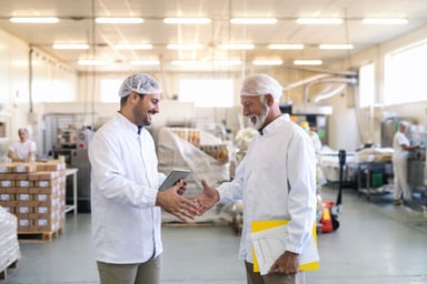 Uniformed Workers in Food Factory
