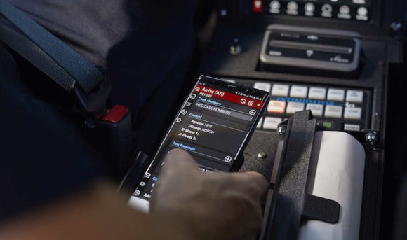 Office holding phone over in-car computer