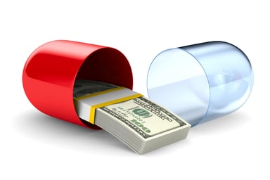 Pill opening with stack of money