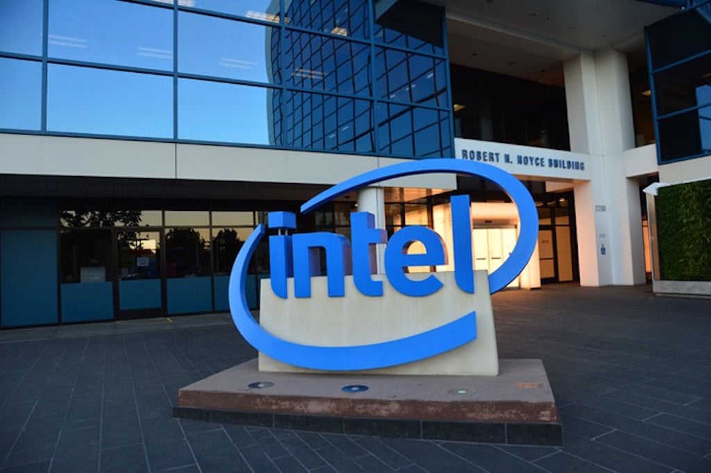 Intel headquarters, with a statue of the Intel logo in front.