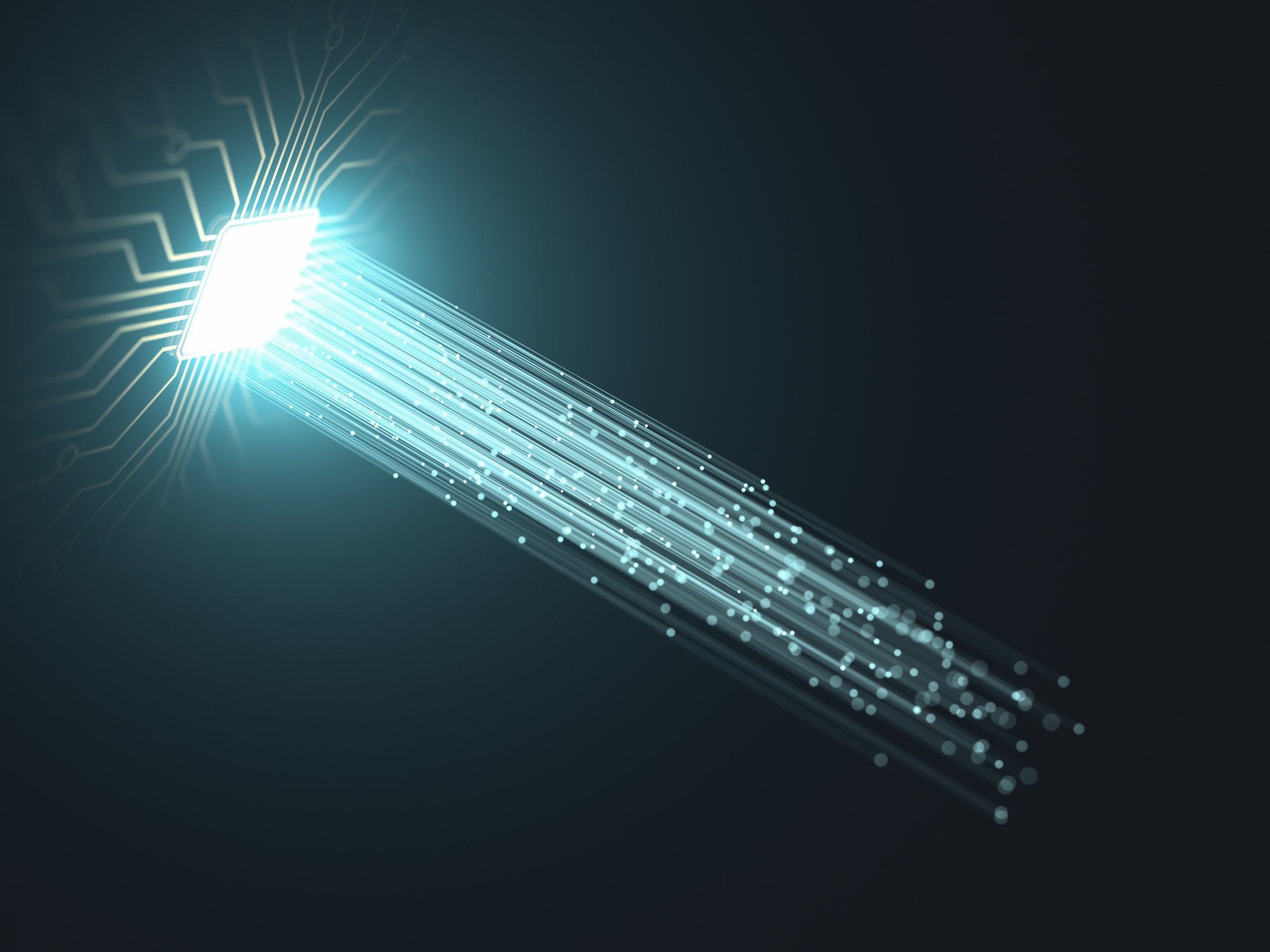 A CPU-shaped opening in a celing of a dark chamber; beams are illuminating blue light into the dark room. 