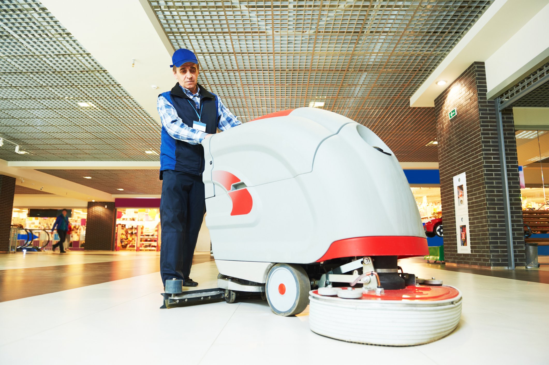 A floor-cleaning machine in action.