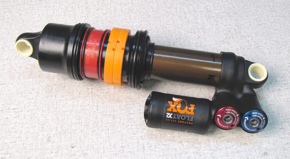 A suspension system component with the Fox logo