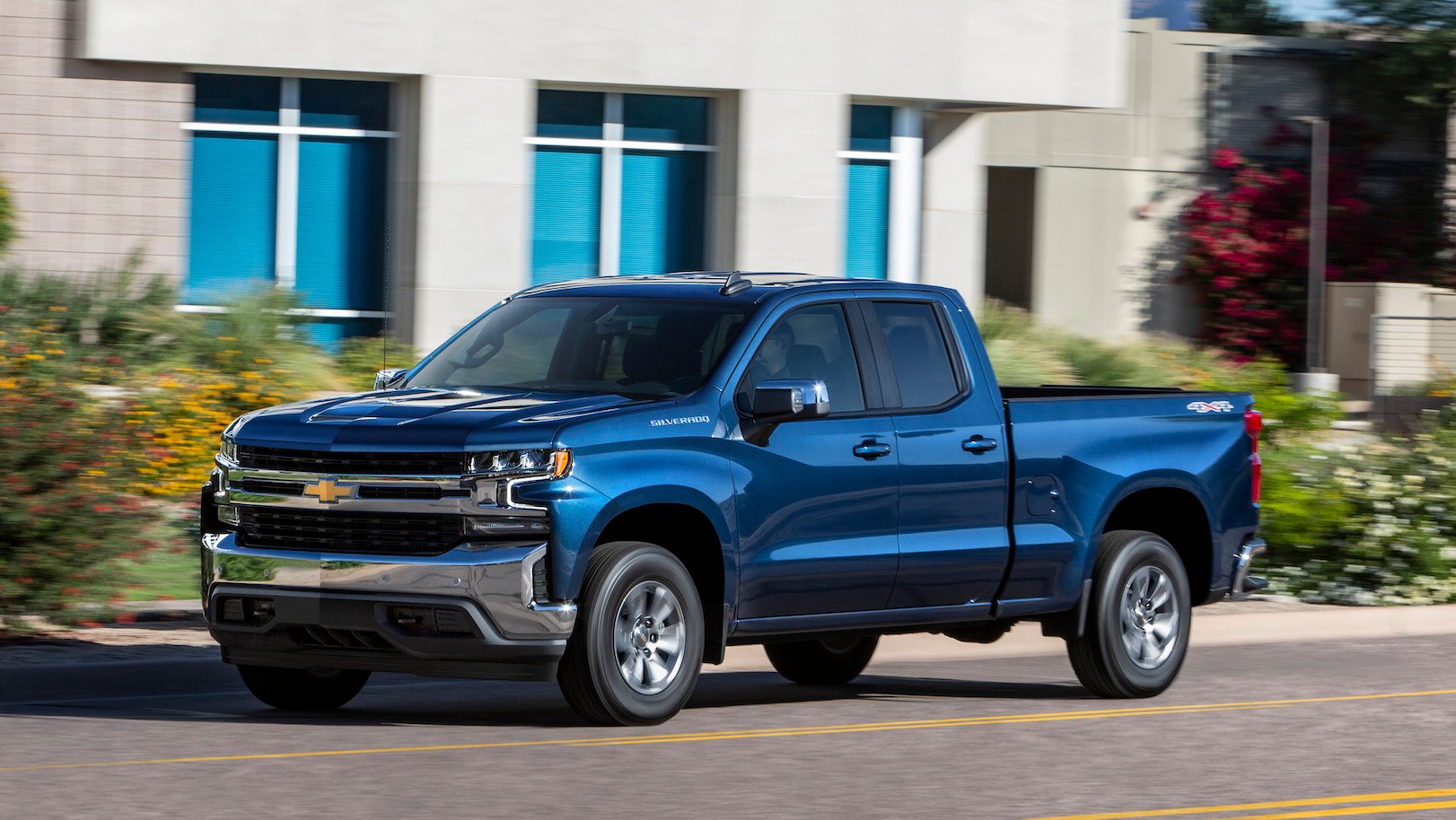 A dark blue 2019 Chevrolet Silverado crew-cab pickup truck
