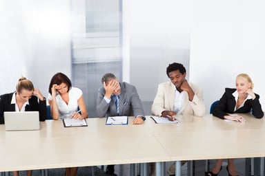 Business people looking upset in meeting