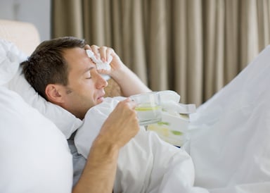 sick man in bed_GettyImages-88689470
