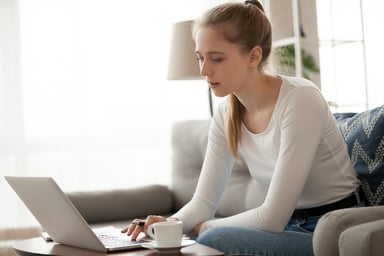 girl typig on laptop_GettyImages-1124667662