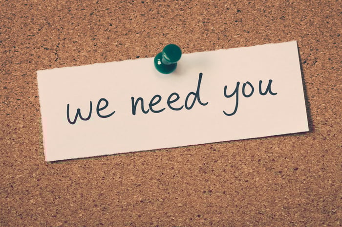 A note says we need you.