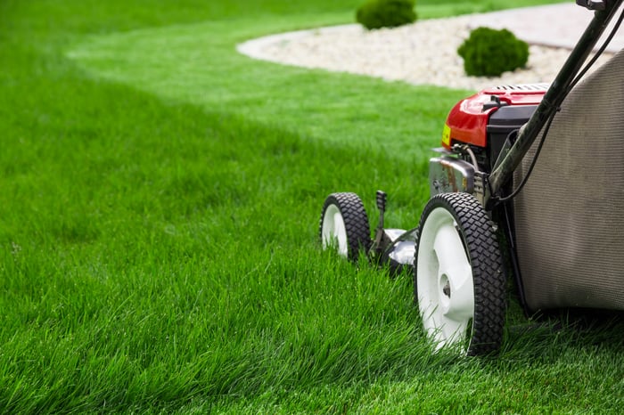 A lawnmower in action.