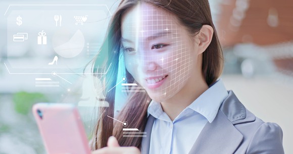 A Chinese business woman shopping on her smartphone