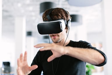 man using virtual reality headset VR