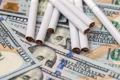cigarette money taxes costs smoking source-getty