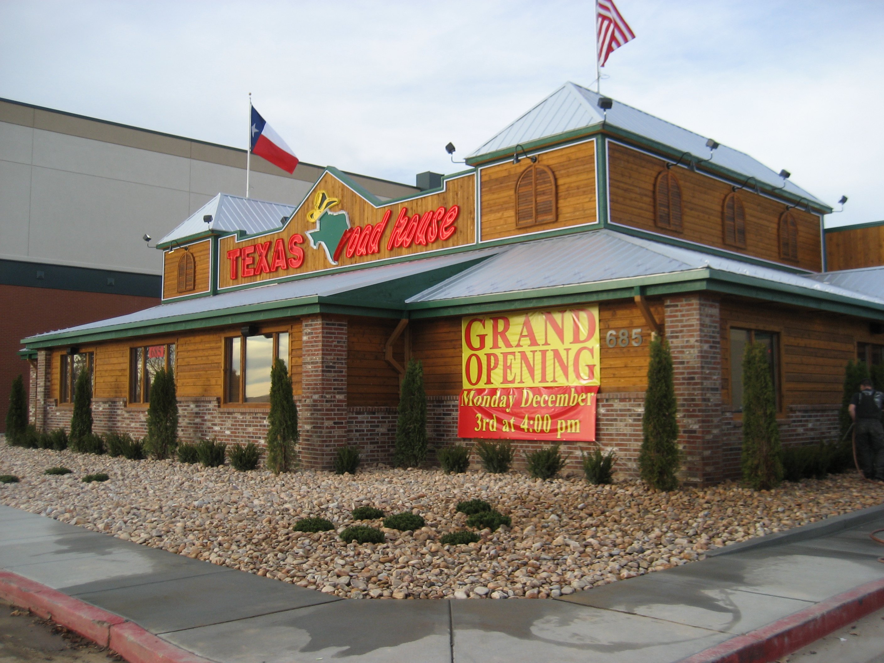 Exterior shot of a Texas Roadhouse during its grand opening in Utah.