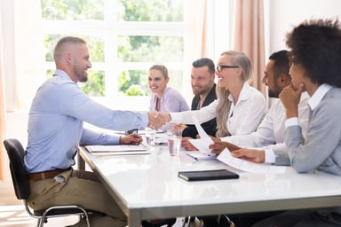 Businessman Shaking Hands With Interviewer