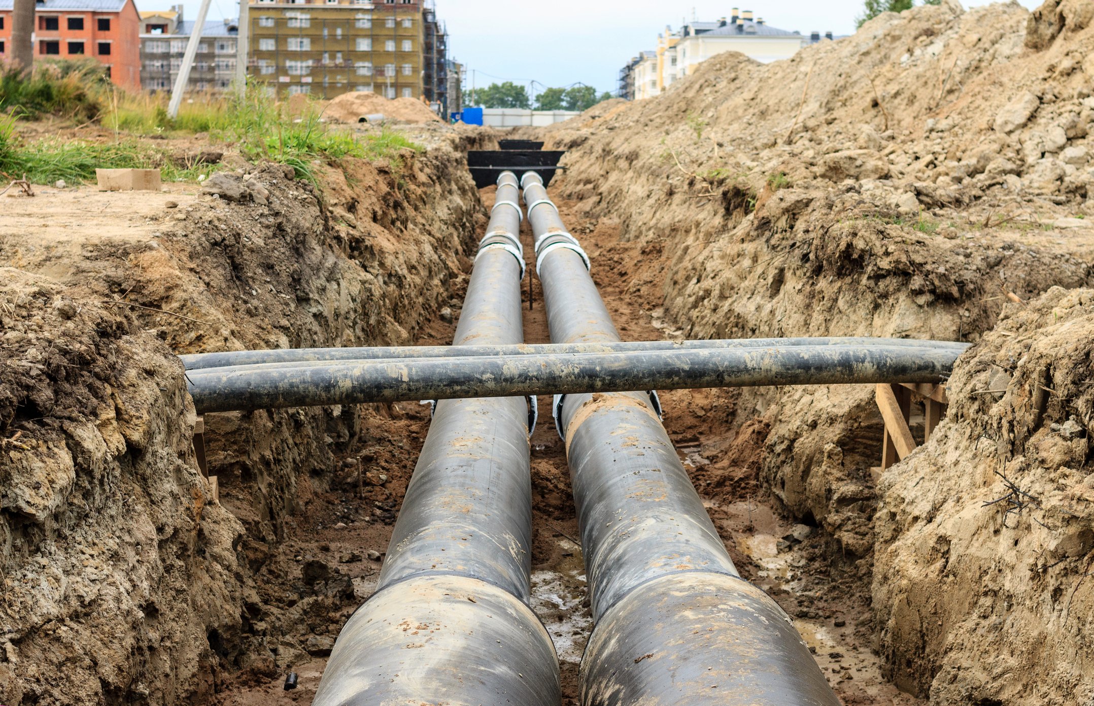 A pair of pipelines in a trench
