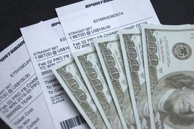 Sports Bets with Cash Showing