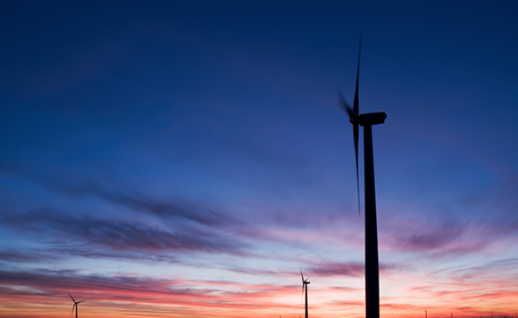 Wind turbines at sunset.