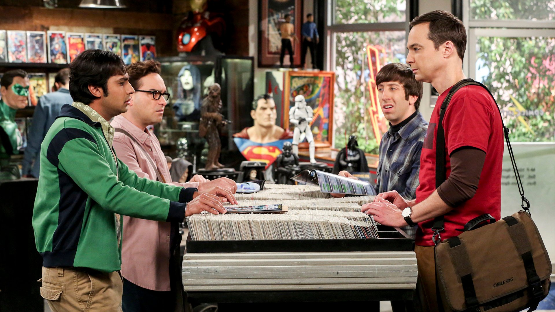 The characters from The Big Bang Theory in a comic book shop.