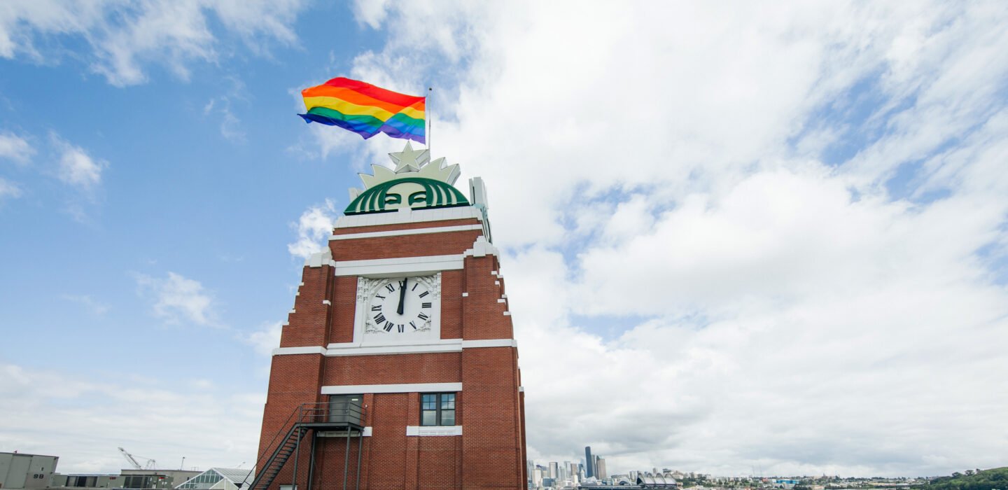 Pride flag atop a Starbucks location.