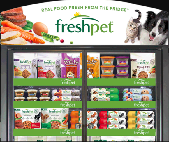 A Freshpet refrigerator fully stocked with Freshpet dog and cat good.