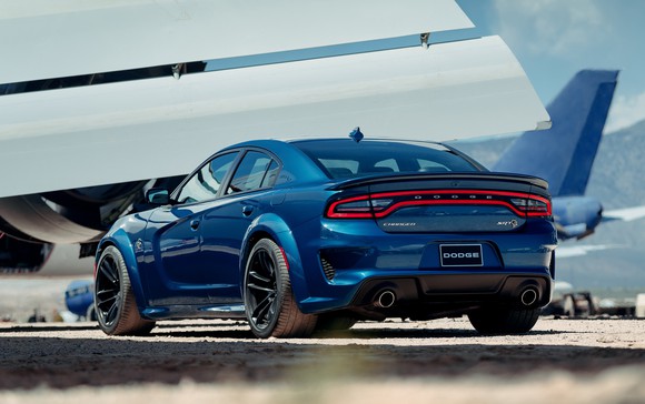A blue 2020 Dodge Charger SRT Hellcat Widebody, a big high-performance sedan with aggressive styling.