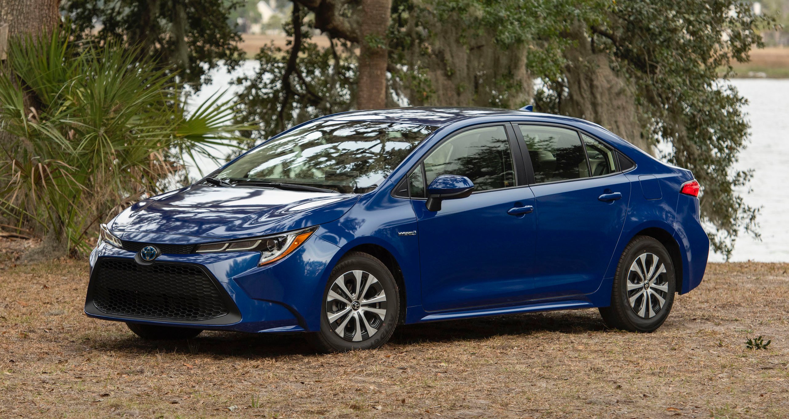 A blue 2020 Toyota Corolla Hybrid, a compact four-door hatchback.