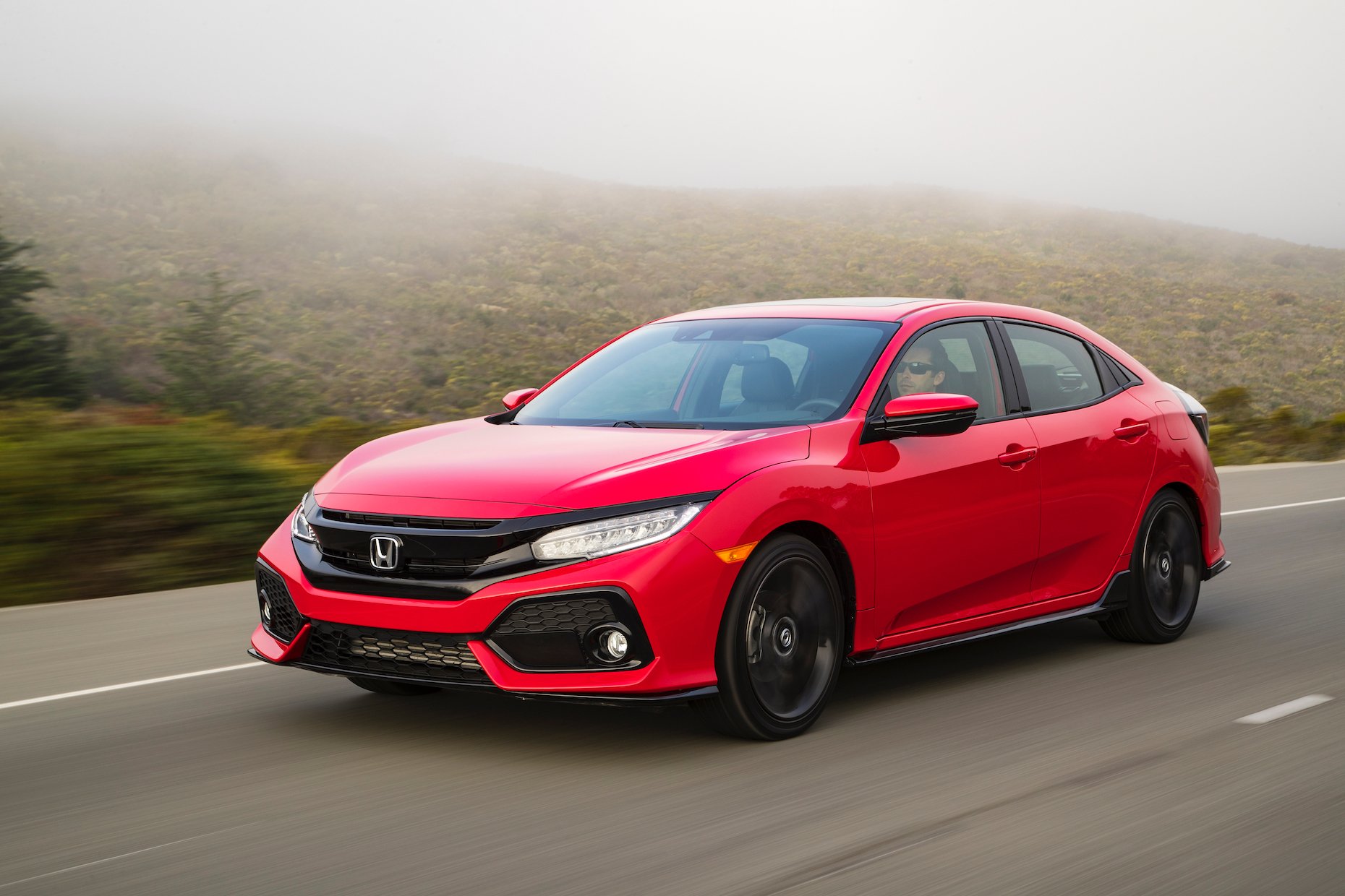 A red 2019 Honda Civic, a compact sedan