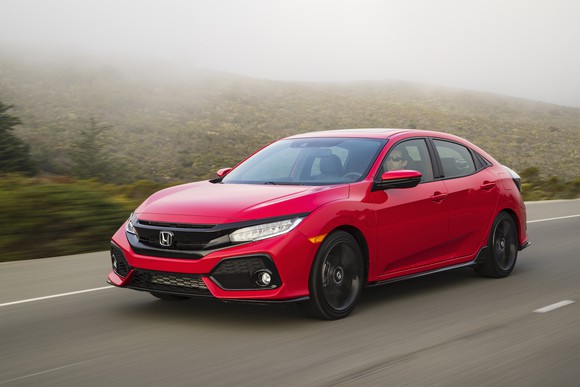 A red 2019 Honda Civic, a compact sedan