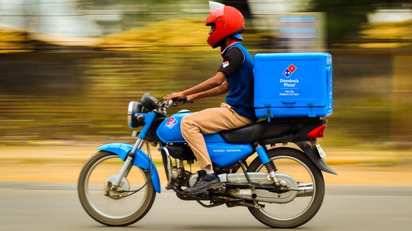 Pizza Delivery Man On Motorcycle