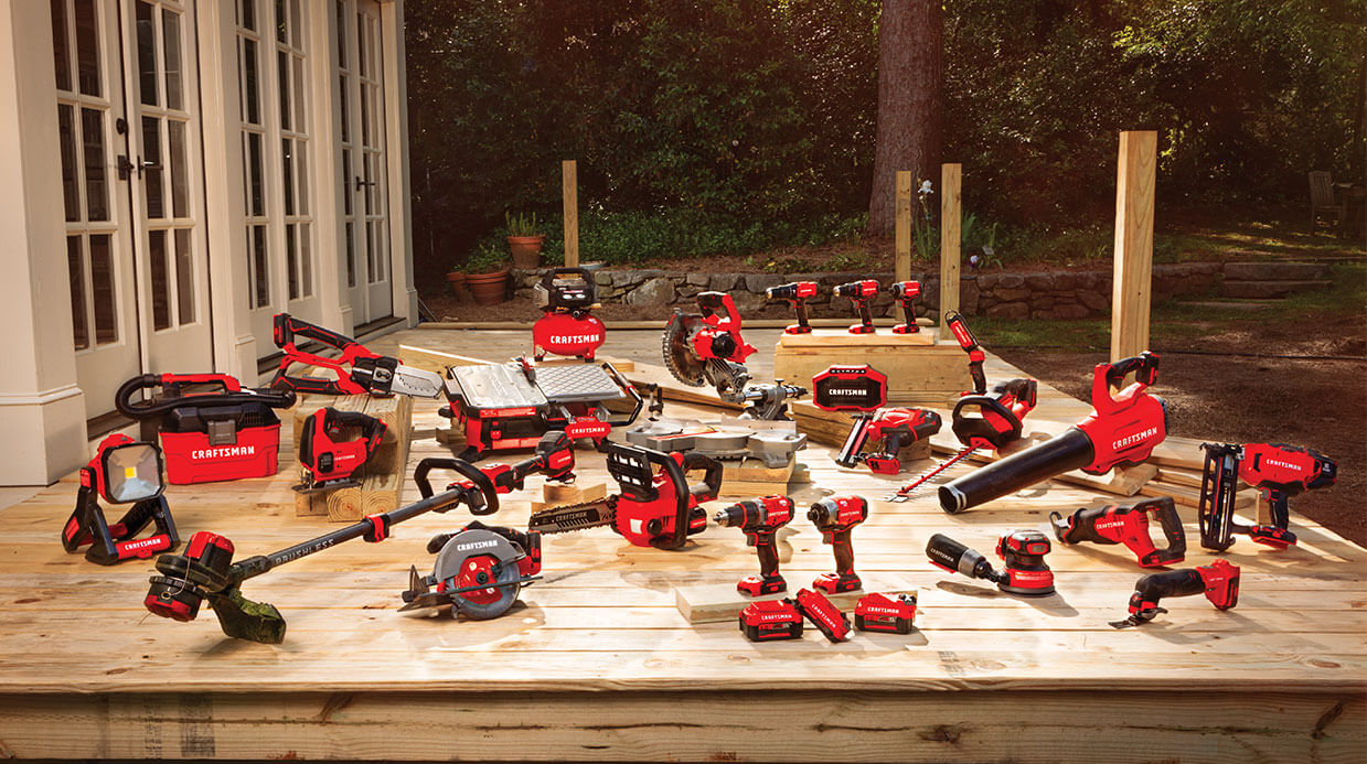 A range of Craftsman tools laid out on a deck