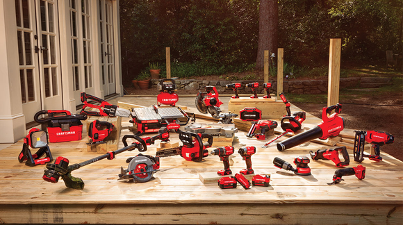 A range of Craftsman tools laid out on a deck