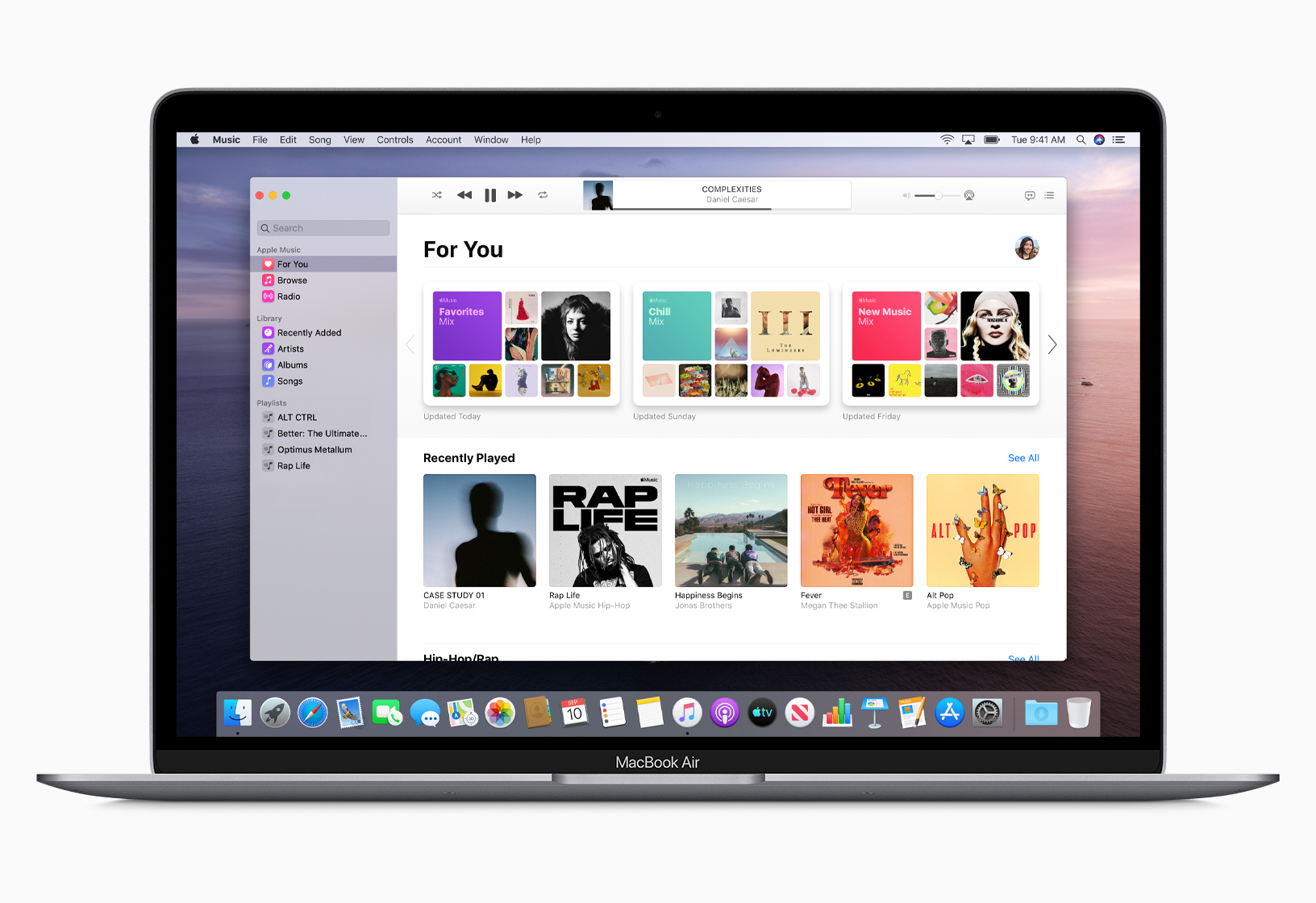 Apple Music interface displayed on a MacBook