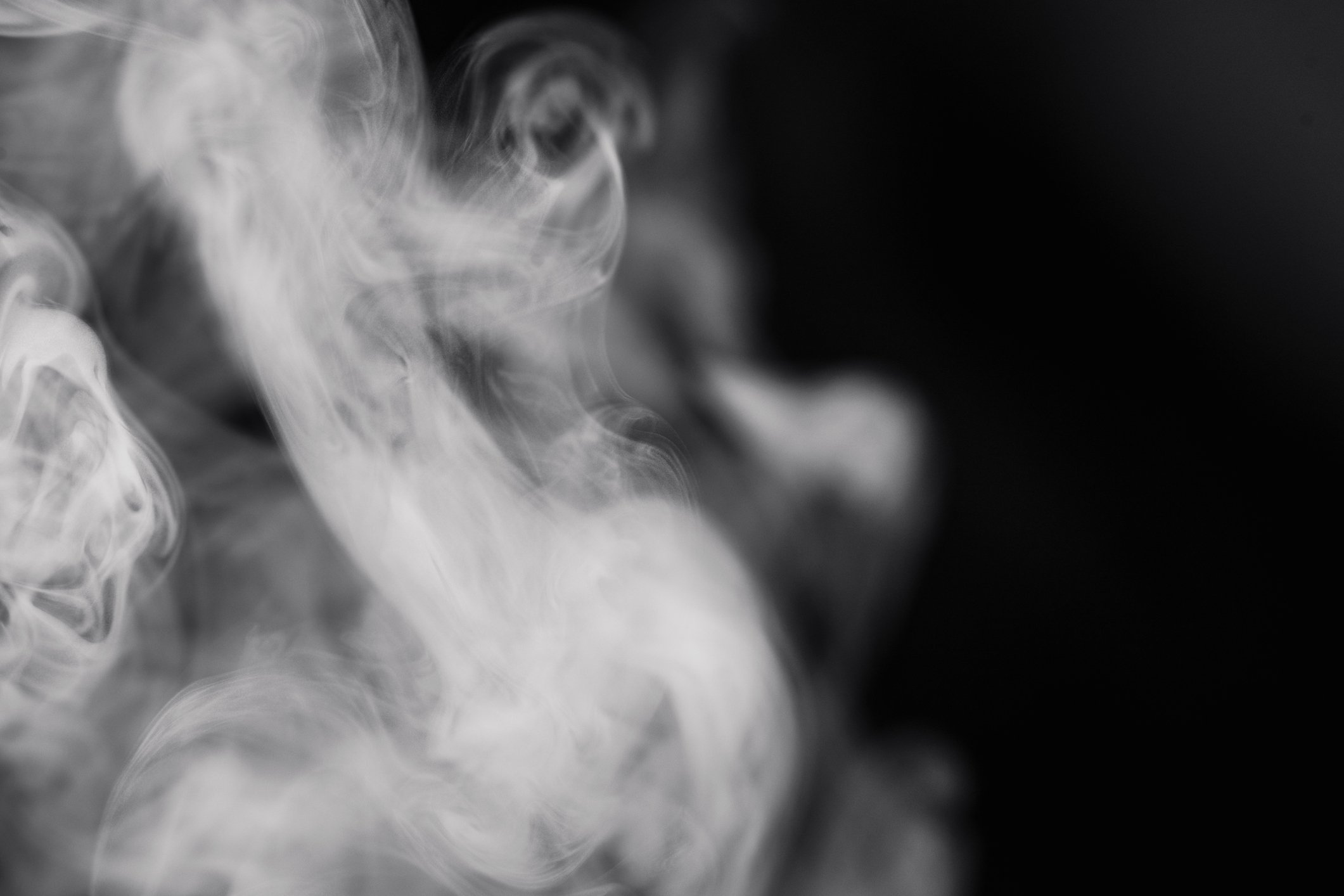 Smoke against a black background