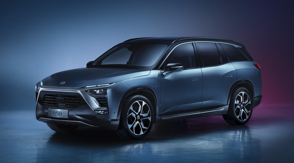 A blue NIO ES8, an upscale 7-passenger electric SUV.