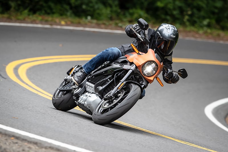Rider coming around curve on a LiveWire motorcyle.