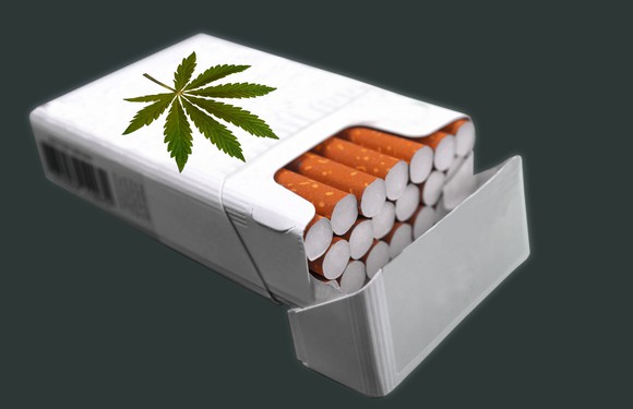 Cigarette box with marijuana logo.