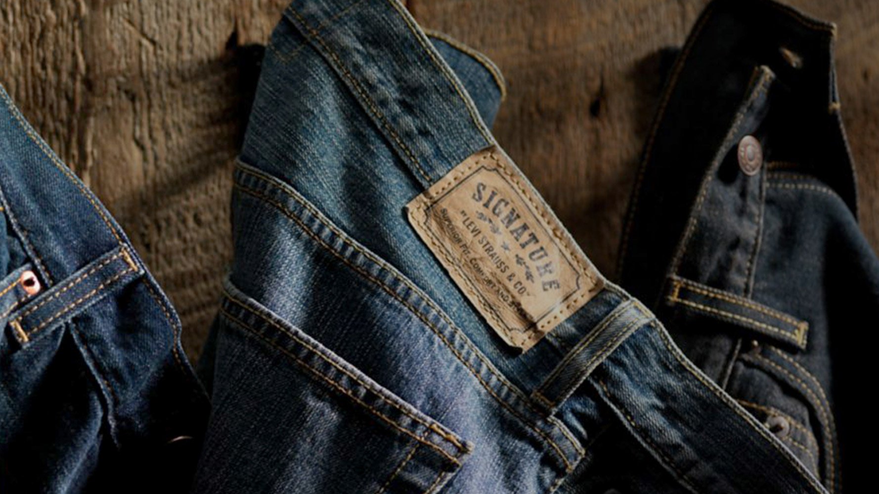 Levi Strauss vintage blue jeans hanging on a wall