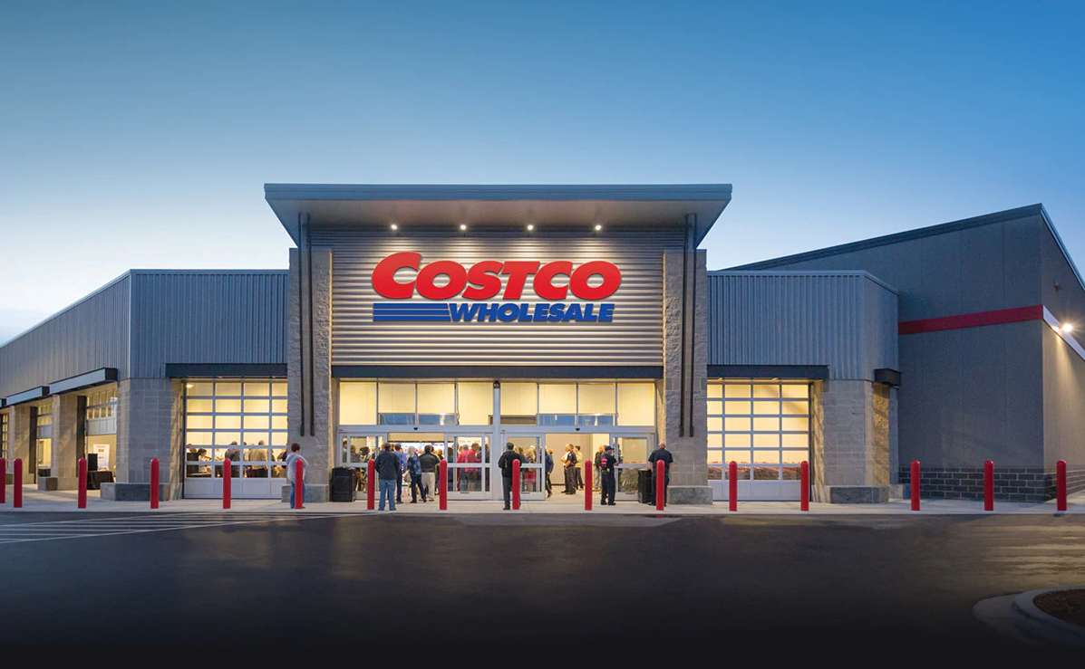 The front of a Costco Store at dusk