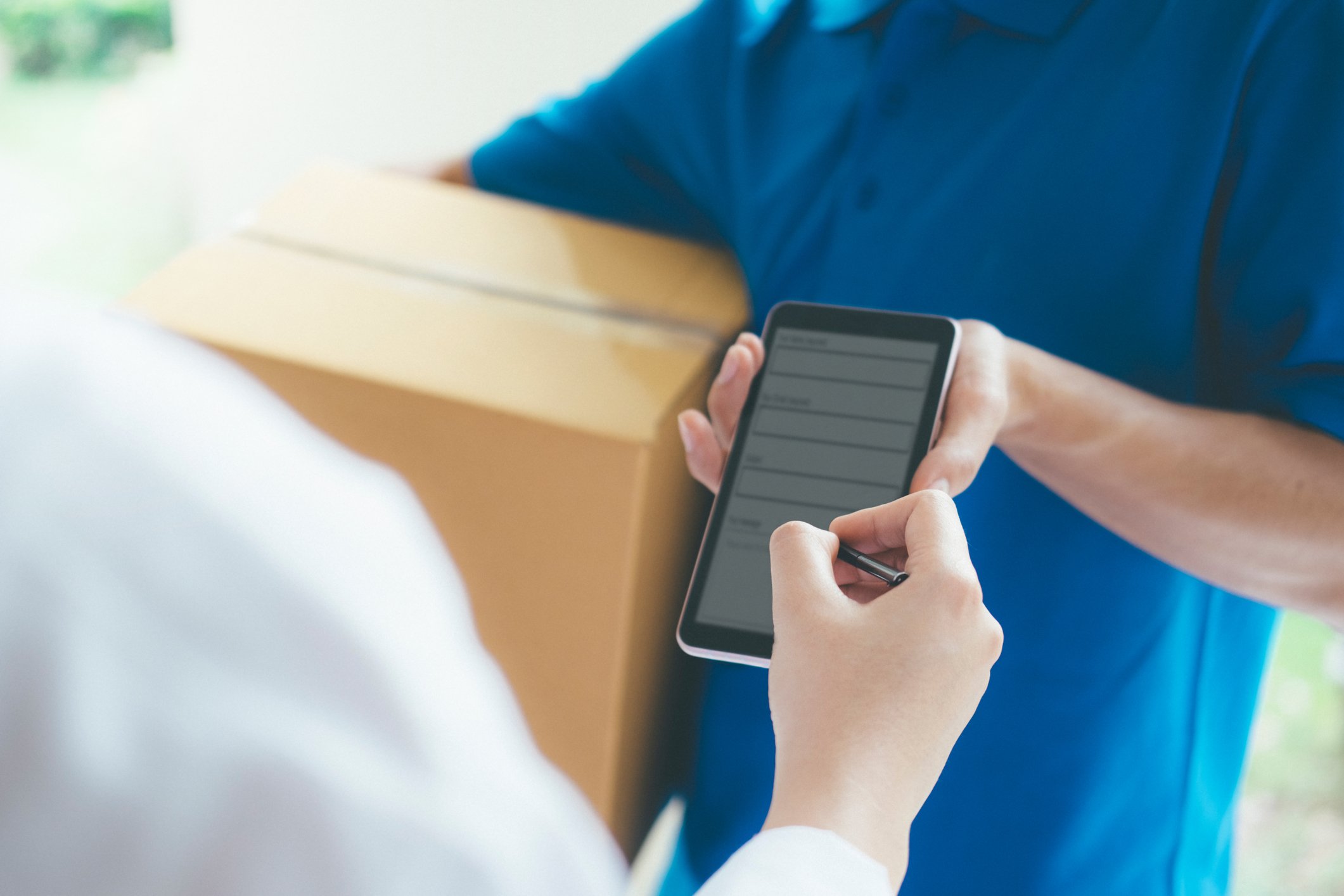 A person delivers a package.