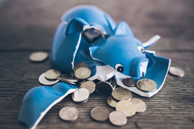 A smashed piggy bank.