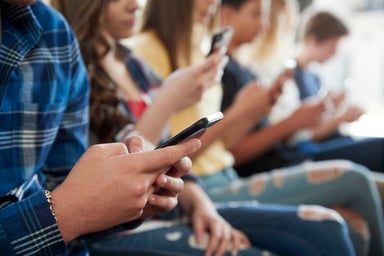 Teens Gen Z using mobile social media apps