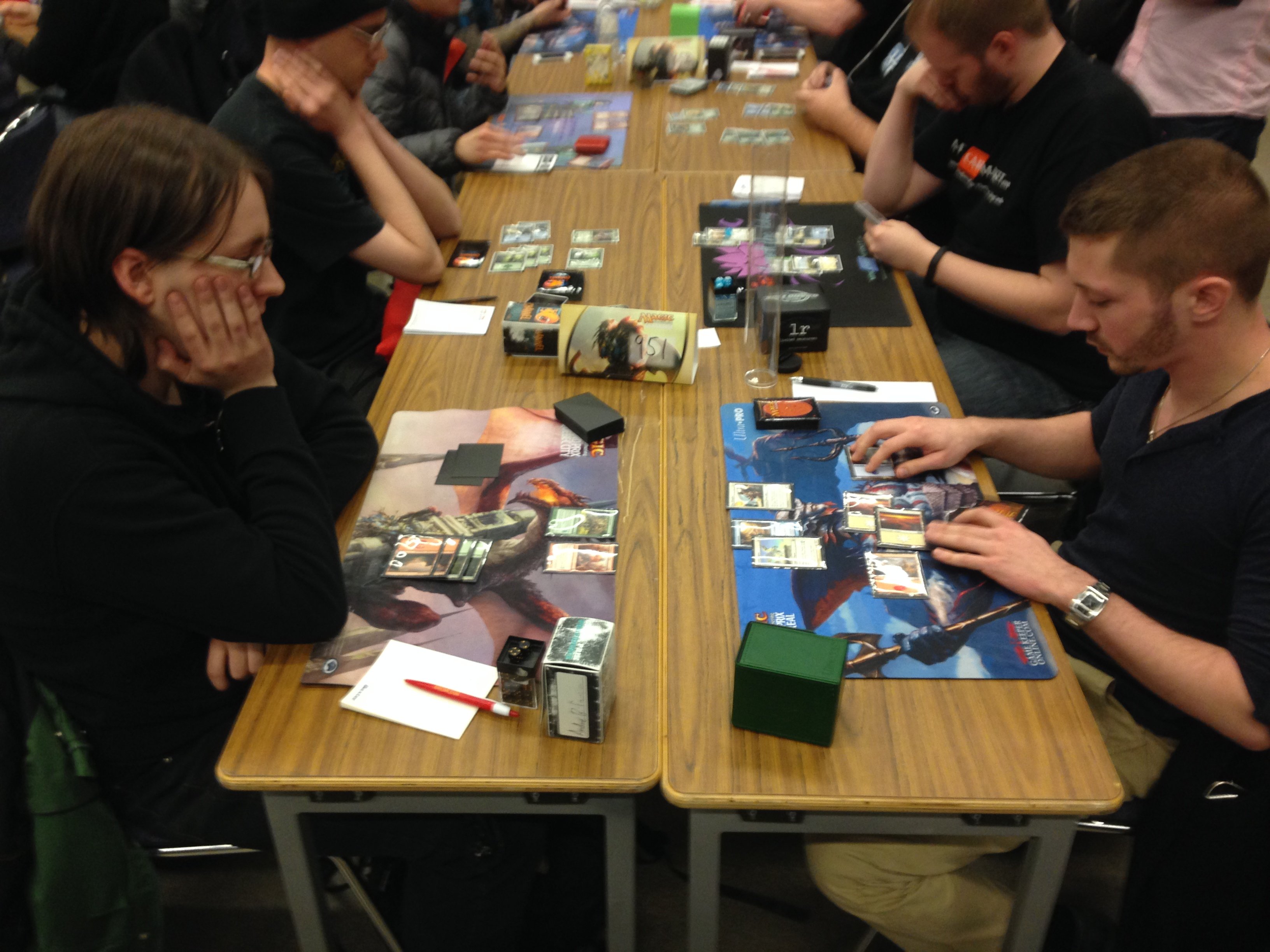 People playing at a Mgic: The Gathering tournament