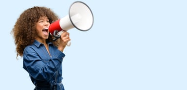 Woman shouting through megaphone
