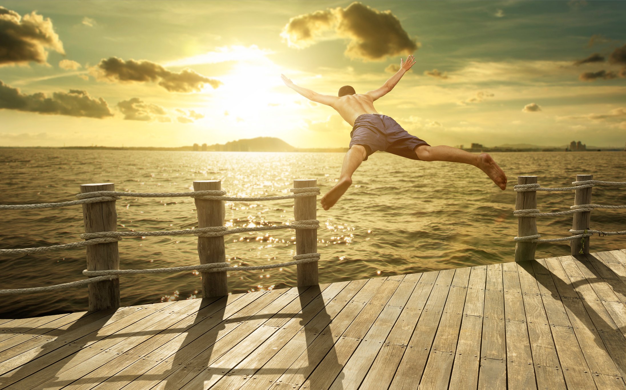 Man diving into water