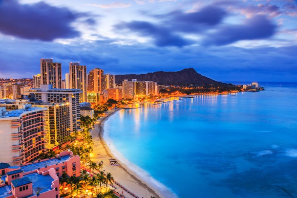 Honolulu's skyline and oceanfront seen at night.